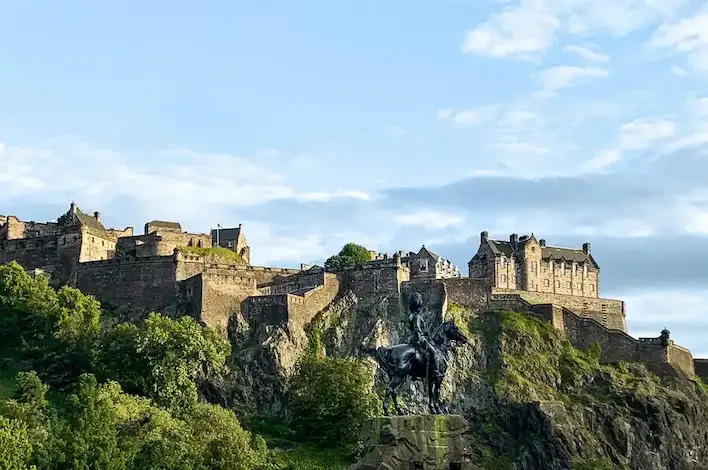A photograph of Edinburgh Castle taken at a distance.